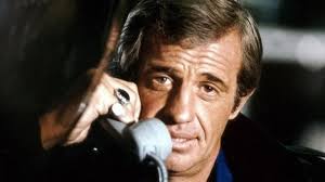Belmondo's name was in the headlines in hollywood in april 1996, when he lashed out at the hollywood studios and distributors. Fgjpejnqlj3fjm