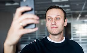 A demonstrator clashes with a police officer during a protest against the jailing of opposition leader alexei navalny in pushkin square in moscow, russia, saturday, jan. Russia Frees Opposition Leader As Kremlin Race Heats Up Arab News