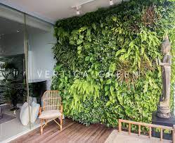 Sampan Place Singapore Bringing In The Tropical Forest Look To Your Balcony Complete The Look With Some Fur Living Green Wall Tropical Garden Green Wall