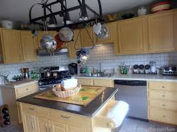 A herringbone brick stenciled kitchen backsplash. Faux Painted Subway Tile The Tutorial Sweet Parrish Place