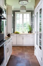 Contemporary Kitchen Design Ideas With Brown Stone Tiles Floors Kitchen Renovation In Economica Stone Tile Kitchen Floor Trendy Kitchen Tile Kitchen Floor Tile