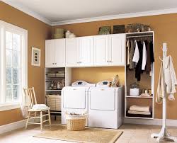 The earthy tone plays off the warm wood floors nicely and is a pleasing alternative to traditional white. Laundry Rooms Apartments I Like Blog
