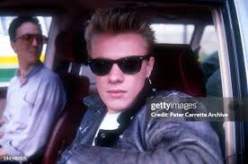 Australian guitarist Tim Farriss performs live