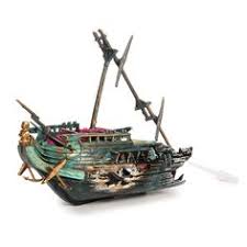 Popular ones include the shipwreck and pirate with a pot of gold. 42 Fishtank Ornaments Ideas Fish Tank Aquarium Decorations Aquarium Ornaments