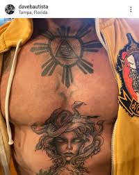 1.28 dave bautista's hand tattoos 1.29 angel and an owl tattoo Just Dave Bautista Showing Off His New Medusa Tattoo No Sort Of Conspiracy Is Here 9gag
