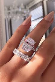 42 Wedding Ring Sets That Make The Perfect Pair Wedding Forward Dream Engagement Rings Moissanite Engagement Ring Halo Wedding Rings Solitaire