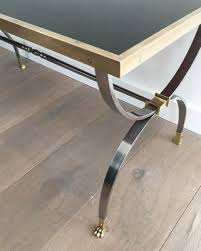 Leick home 10034uv favorite finds ivory finish coffee table. French Neoclassical Style Brushed Steel Brass Coffee Table With Claw Feet Black Lacquered Glass Top By Maison Jansen 1940s For Sale At Pamono