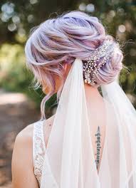 Form a high ponytail on your head. Trending Now Boho Chic Messy Bun Wedding Hairstyles Green Wedding Shoes