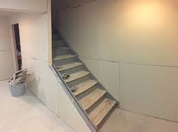 Be sure to check out our basement reveal post to see the door hardware. Staircase Remodel Diy Basement Stair Transformation Revival Woodworks