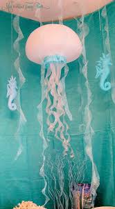 Jellyfish hanging lamps are the perfect lamps for a romantic summer party. Mermaid Birthday Party Miss Frugal Fancy Pants Mermaid Theme Party Mermaid Birthday Party Mermaid Birthday