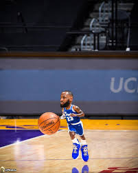 Lakers in their blue 60s jerseys that they wore from the start in la (when they used to play at the sports arena, the clippers' old home). Tiny Bron Classic Blue Jersey Lakers