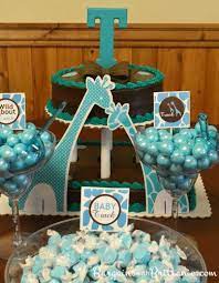 Throw A Great Baby Shower With Party Decor From Oriental Trading Baby Shower Giraffe Baby Shower Fun Baby Shower
