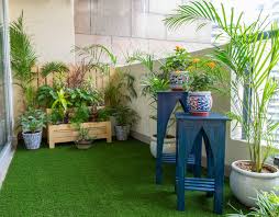 The wooden floor tiles make the space looks like something out of a catalogue! 8 Balcony Railing Designs For Urban Homes