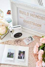 The bright and vibrant photographs produced are just the right size to pas around while at an event or to save in your wallet or purse. Kara S Party Ideas Instax Photo Guestbook For Your Wedding Or Shower Kara S Party Ideas