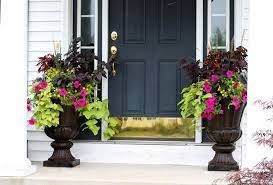 Oversized flower pots are also great, especially if you have a path leading to your front door. 65 Pretty Front Door Flowers Pot Ideas Page 34 Of 73 Front Door Planters Door Planter Garden Front Of House