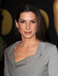 Sandra Bullock se refugia en Hugh Grant y Keanu Reeves