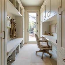 When your laundry room is so functional and pretty you even start enjoying the laundry! Could I Have Desk Area In Hallway From Garage Door Entrance Facing Into Sunroom Forming A Half Wall Kind Of Mudroom Laundry Room Hallway Designs Home Decor