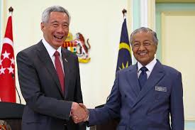 Why did singapore leave malaysia? Malaysia Singapore Vow To Reach Friendly End To Water Spat Bloomberg