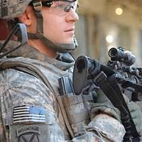 U.S. Navy Masters-at-Arms 3rd Class David Aljure, right,