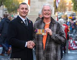 World War II hero William McMurdo reunited with medals he lost near the  Cenotaph