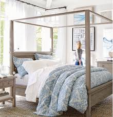 Farmhouse Canopy Bed And Nightstand In Gray Wash Chunk Wool Rug In Grey Farmhouse Canopy Beds Master Bedrooms Decor Barn Bedrooms