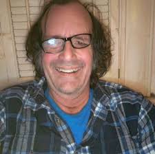 What is a good seafood restaurant in Galveston with good drinks?