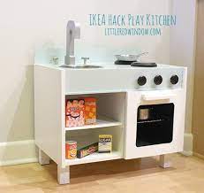 Roll out the adhesive faux marble on a table and place the kitchen counter top on. Ikea Hack Play Kitchen Fridge And Microwave Little Red Window