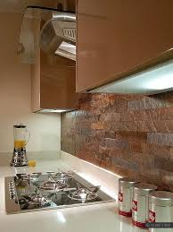 Small interiors design dashing kitchen backsplash brings golden hue to the kitchen [from: Copper Tiles For Kitchen Backsplash Rumah Joglo Limasan Work