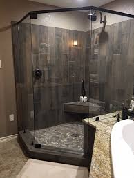 Once your brook's water is flowing freely, it's time to devise a plan for your river rock landscaping. Guest Shower With Grey Weathered Barn Wood Style Tiles And River Rock Floor In My Guest Bathroom Oil Rubbed Bronze Fixtures Home Remodeling Shower Remodel
