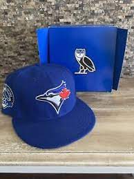 The crown of the hat is featured in forest green. 2013 New Era Ovo Drake Toronto Blue Jays Fitted Cap Hat Box 7 5 8 Ebay