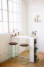 View in gallery traditional kitchen island with a small table insert and display area. A Guide To Efficient Small Kitchen Design For Apartment Small Kitchen Bar Kitchen Table Small Space Small Kitchen Tables