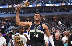 Milwaukee (ap) — giannis antetokounmpo had the larry o'brien trophy in one arm, the nba finals. Cydmcp1f8eoawm