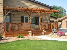 Decorate with lanterns, a chalkboard sign and a wooden box full of pansies. Front Porch Deck Designs Front Deck Ideas