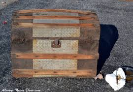 Unique pressed tin bubble pattern tin facing in turquoise with chrome tanned leather binding. Steamer Trunk Restoration Always Never Done