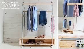 This modern coat rack design made from black walnut wood is both stylish and functional. 23 Chic And Practical Diy Clothes Racks That Put Your Wardrobe On Display