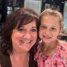 Where can I find a black shoulder bag with gold chain?