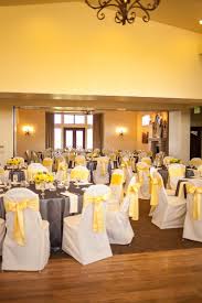 Yellow And Gray Wedding Reception Like The Sashes On The Chairs But With Gray Chevron Table Clothes Grey Wedding Decor Yellow Grey Weddings Yellow Wedding