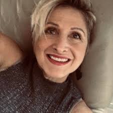 Who can recommend someone to mow 5 acres of land?