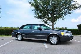 Image result for Toreador Red 1999 Town Car