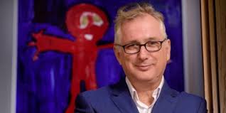 Who was Eric Irons OBE?