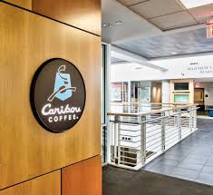 Save on beverages & shop our new arrivals now! University Of Minnesota Hanson Hall Caribou Coffee Ls Black Constructors