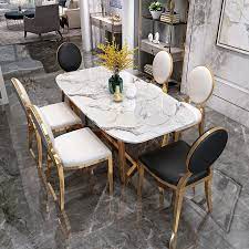 Natural stone such as marble and slate brings an earthy, organic element into a space. Rectangle Gold Designs White Marble Dining Table And 6 Chairs China Dinner Table Modern Style Table Made In China Com