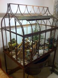 Pin By Judy On Concrete Stone And Rust Victorian Terrariums Victorian Greenhouses Terrarium