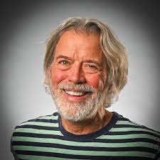 Catherine A. Miller students were in their traditional clothing awaiting  School Board President Charles Long for his visit to hand out retention  checks to the CAM staff members.