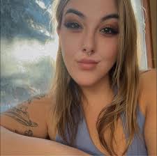 What are the must-see attractions in Calgary, Edmonton, and Banff?