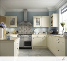 Cream Kitchen Cabinets With Blue Walls In 2020 Blue Kitchen Walls Blue Kitchen Accessories Kitchen