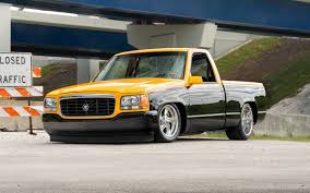 Image result for Bright Yellow 1990 Truck