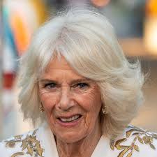 Queen Camilla cuddles adorable puppy Moley inside home she doesn't share  with King Charles