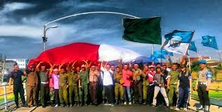 Haul ke 15 h.m rachmatoellah. 40 Okp Dan Pemuda Kediri Kembali Kibarkan Bendera Raksasa Di Puncak Klotok