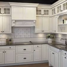 Don't start securing the countertop to the cabinets until the mitered joint has dried. Cabinets Countertops Branford Building Supplies